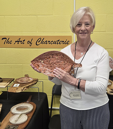 Illustrative. Shirl Lamanca shows off one of her fish-shaped charcuterie plates.