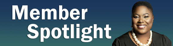 Text reading Member Spotlight next to a head and shoulders portrait photo of Cynthia Boone.